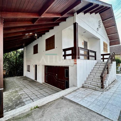 Terreno com Casa