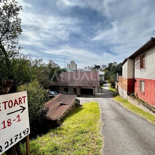 Terreno com Casa